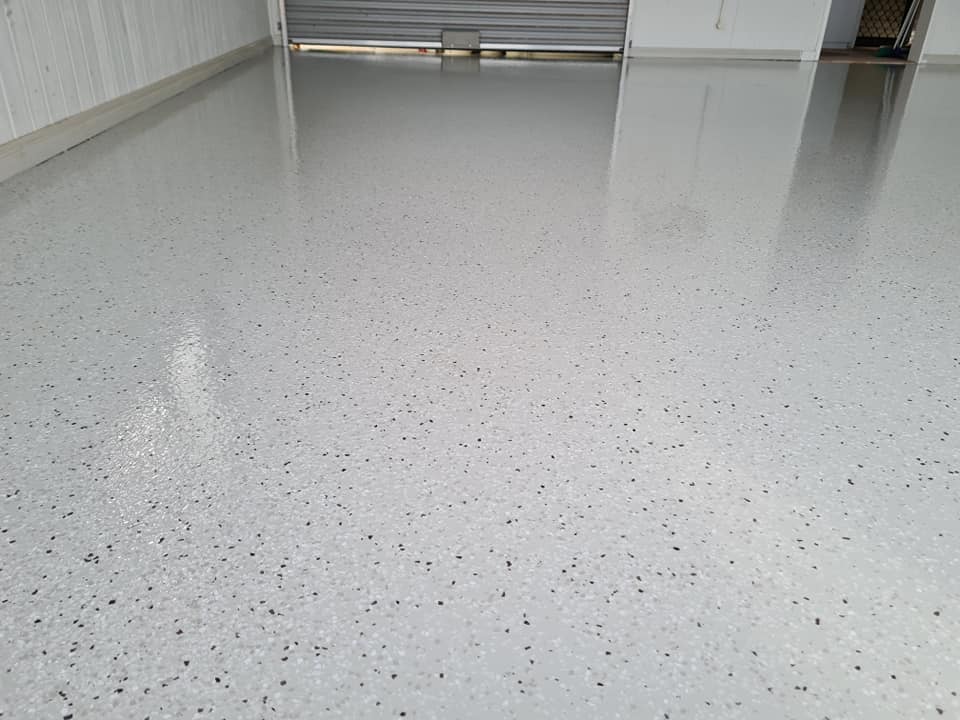 White Flaked Coating Floor Epoxy — Alan Aldridge Floor Sanding in Hervey Bay, QLD