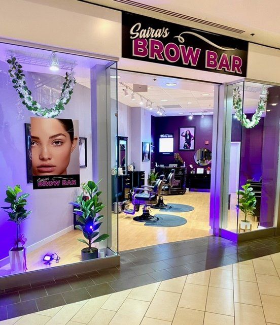 A salon called saira 's brow bar in a mall