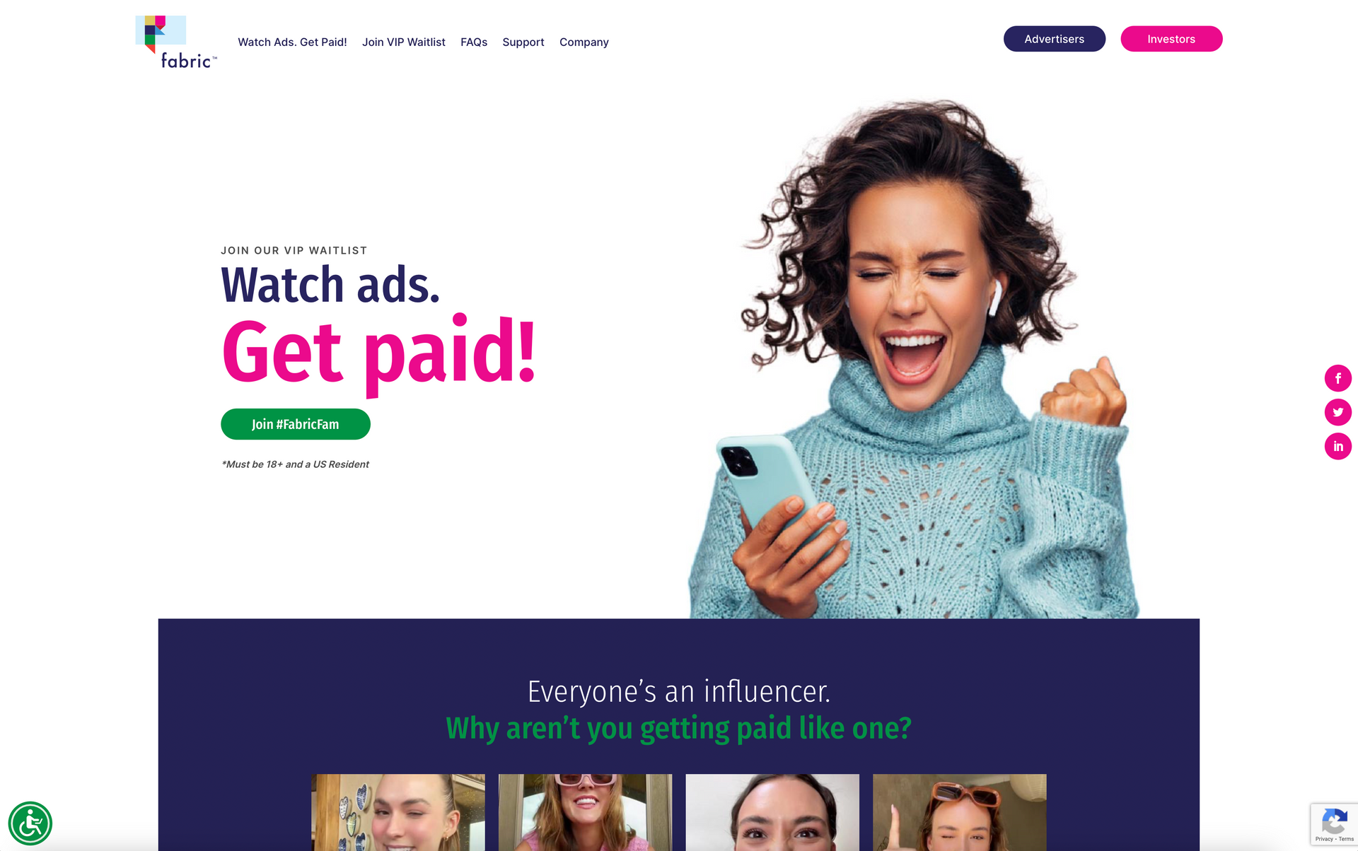 a woman is holding a cell phone in her hand and laughing .