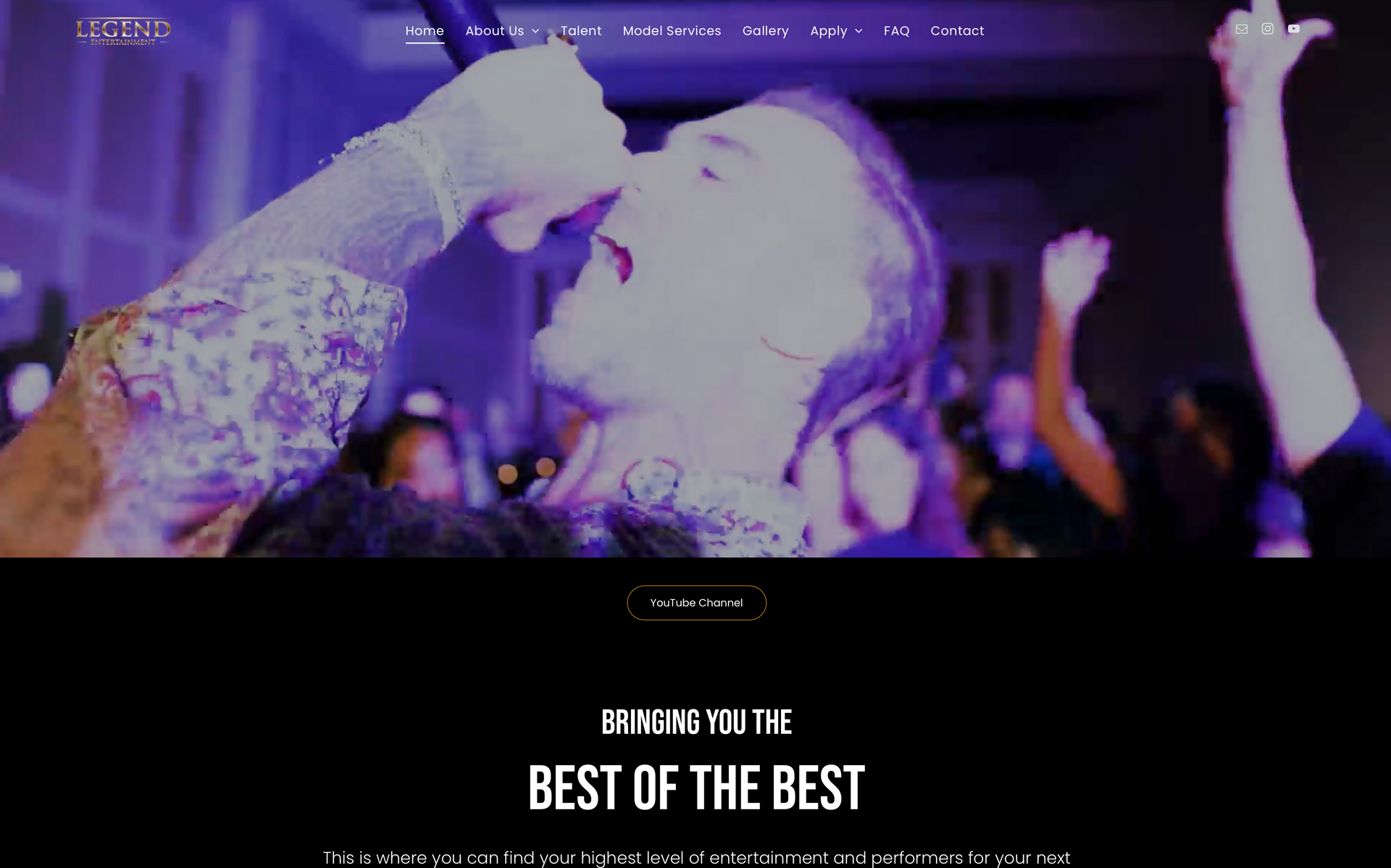 a man is singing into a microphone in front of a crowd .