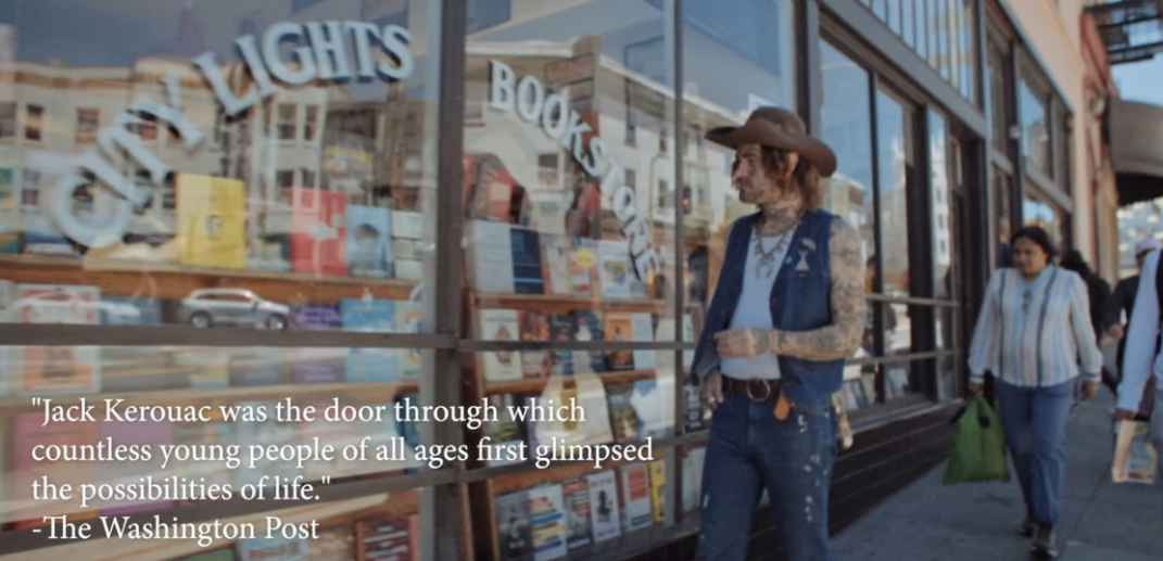 A man in a cowboy hat is standing in front of a book store.