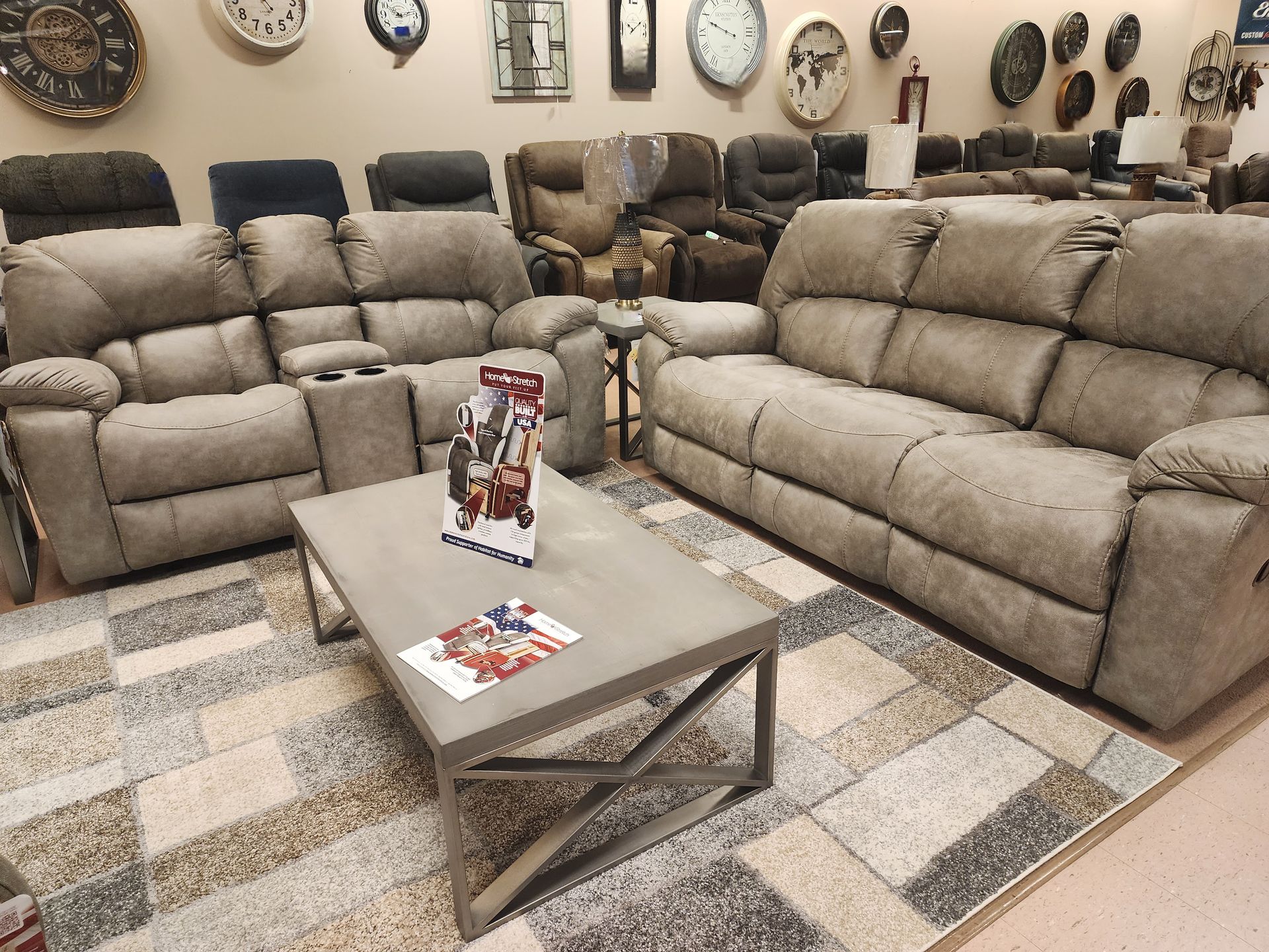 A living room filled with furniture and a coffee table.