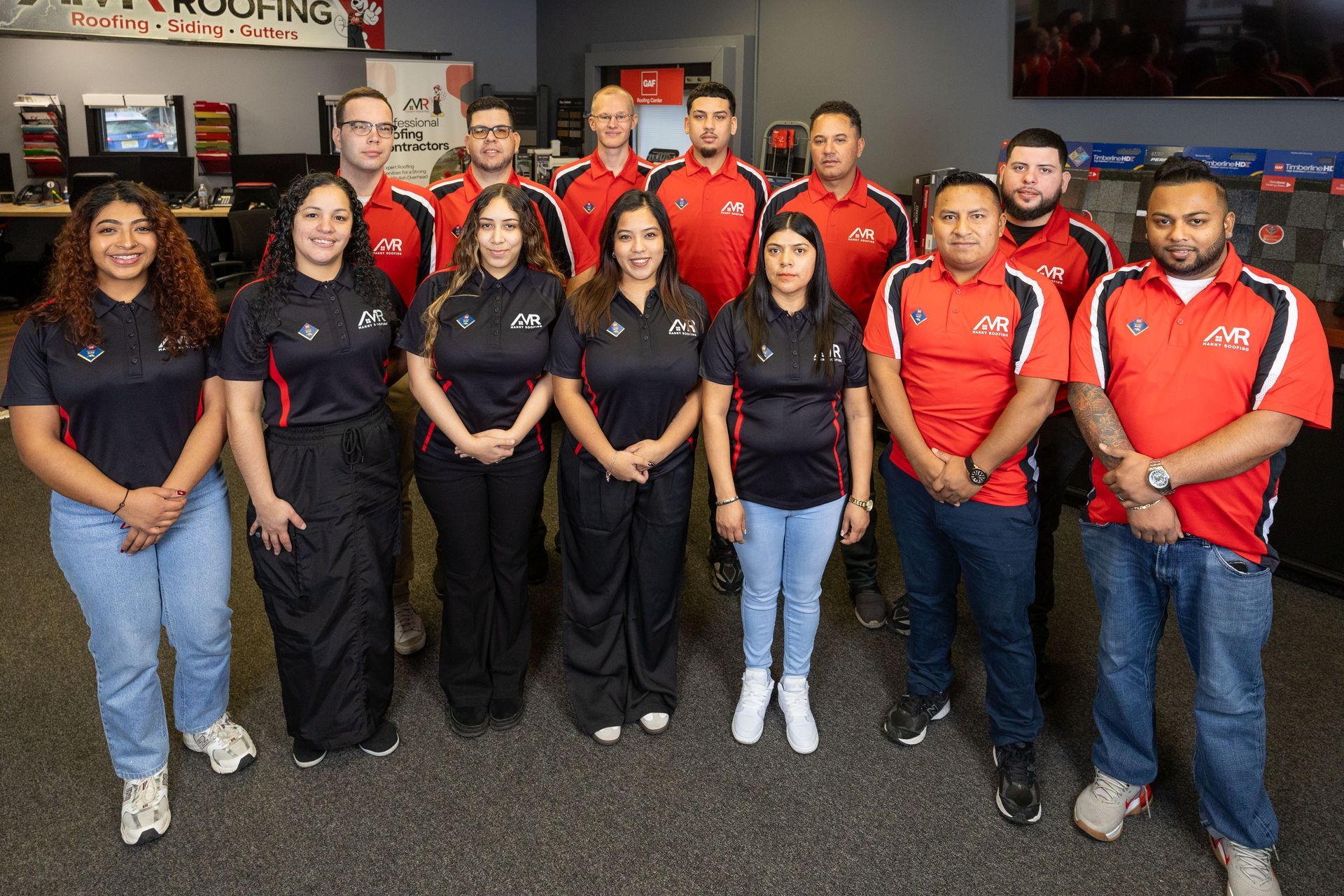 Group photo of the Manny Roofing team.