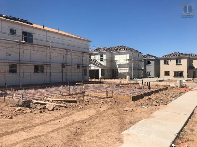 A building under construction with scaffolding around it