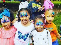 Children with face paint in Pittsburgh for an end of year celebration