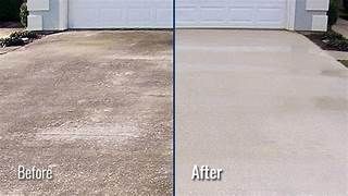 Concrete driveway before and after pressure washing