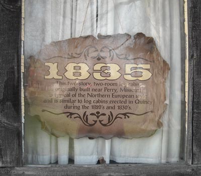 1835 log cabin plaque
