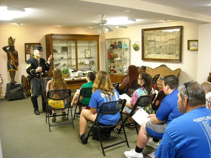 civil war soldier giving lecture to students