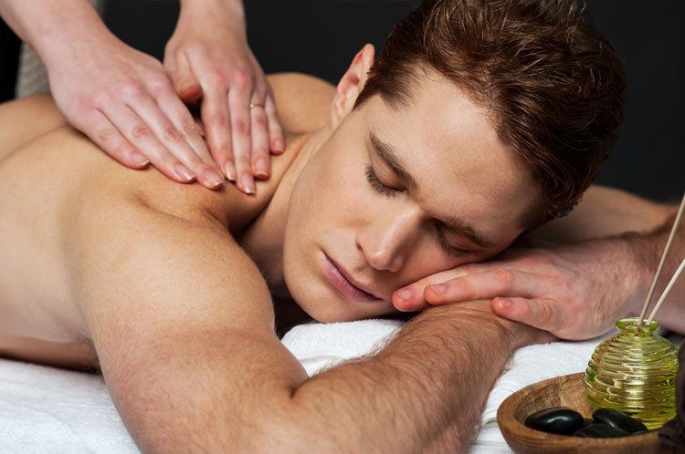 Star Massage Specialist— Man Sleeping While Having A Massage in Irving, TX
