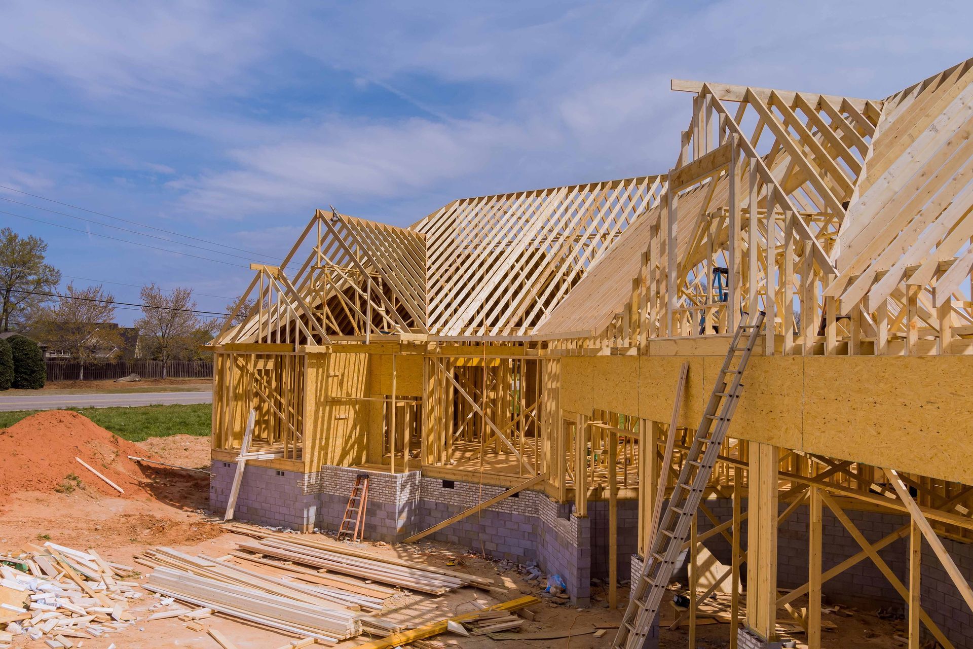 Wood-framed house under construction.
