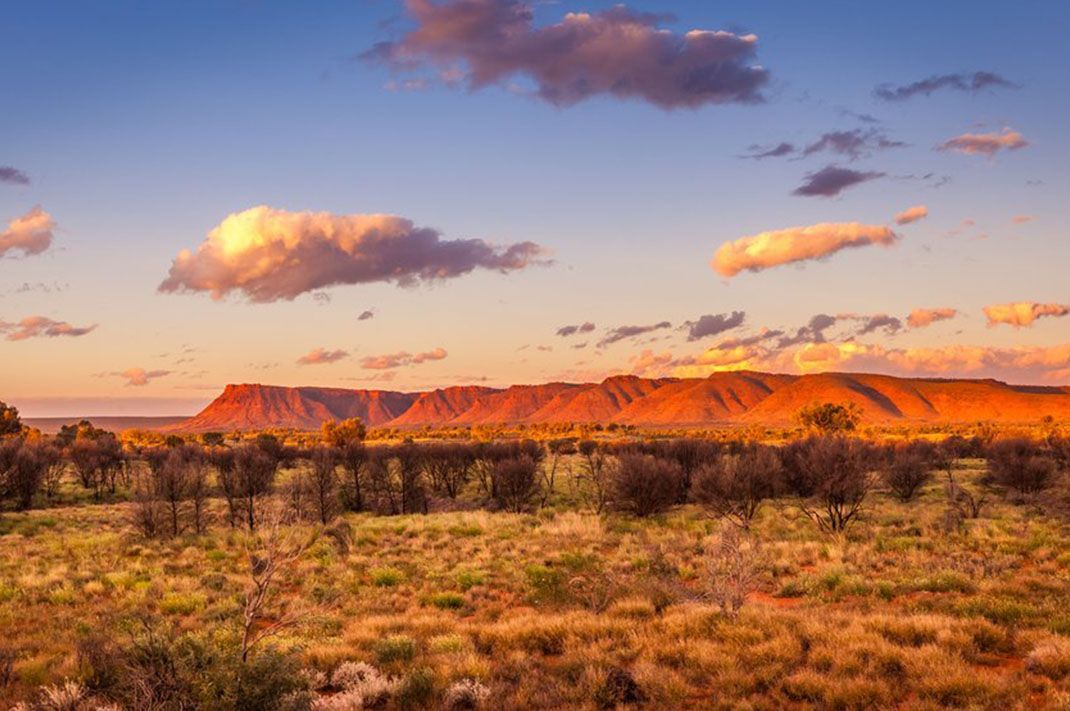 A Desert Landscape with A Mountain in The Background at Sunset — North West Queensland Painting in Northern Territory, QLD