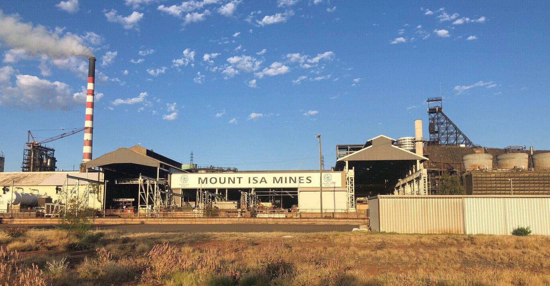 A Large Factory with A Chimney in The Middle of A Field — North West Queensland Painting in The Gap, QLD
