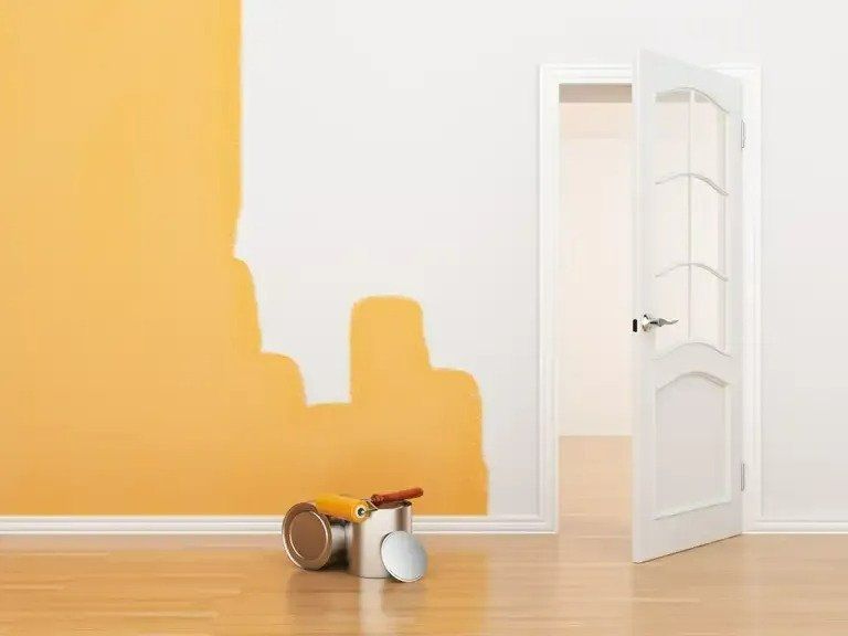 A Room Is Being Painted Yellow and White and A Door Is Open — North West Queensland Painting in Richmond, QLD