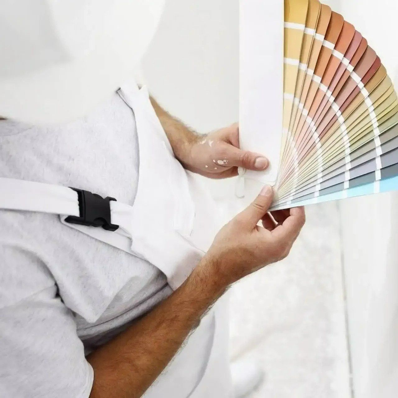 A Man in A White Apron Is Holding a Color Palette — North West Queensland Painting in Mornington Island, QLD