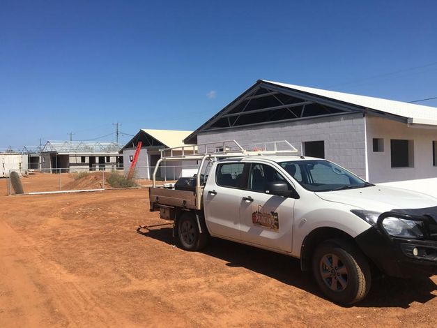 A White Truck Is Parked in A Dirt Lot in Front of A Building — North West Queensland Painting in The Gap, QLD