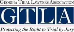The logo for the georgia trial lawyers association protecting the right to trial by jury.