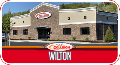 Collision repair shop building with red and tan exterior, sign reading “Collision Wilton”