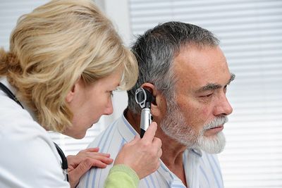 Adult Hearing Care — A Female Doctor Checking the Patient's Ears in Doylestown, PA