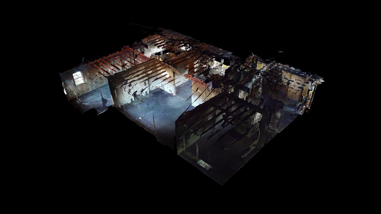 An aerial view of a building at night.