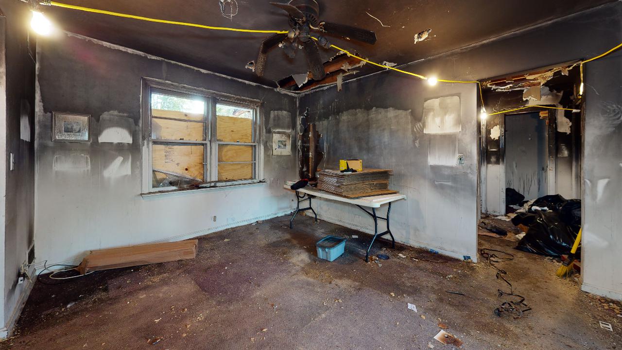 There is a table in the middle of the room.