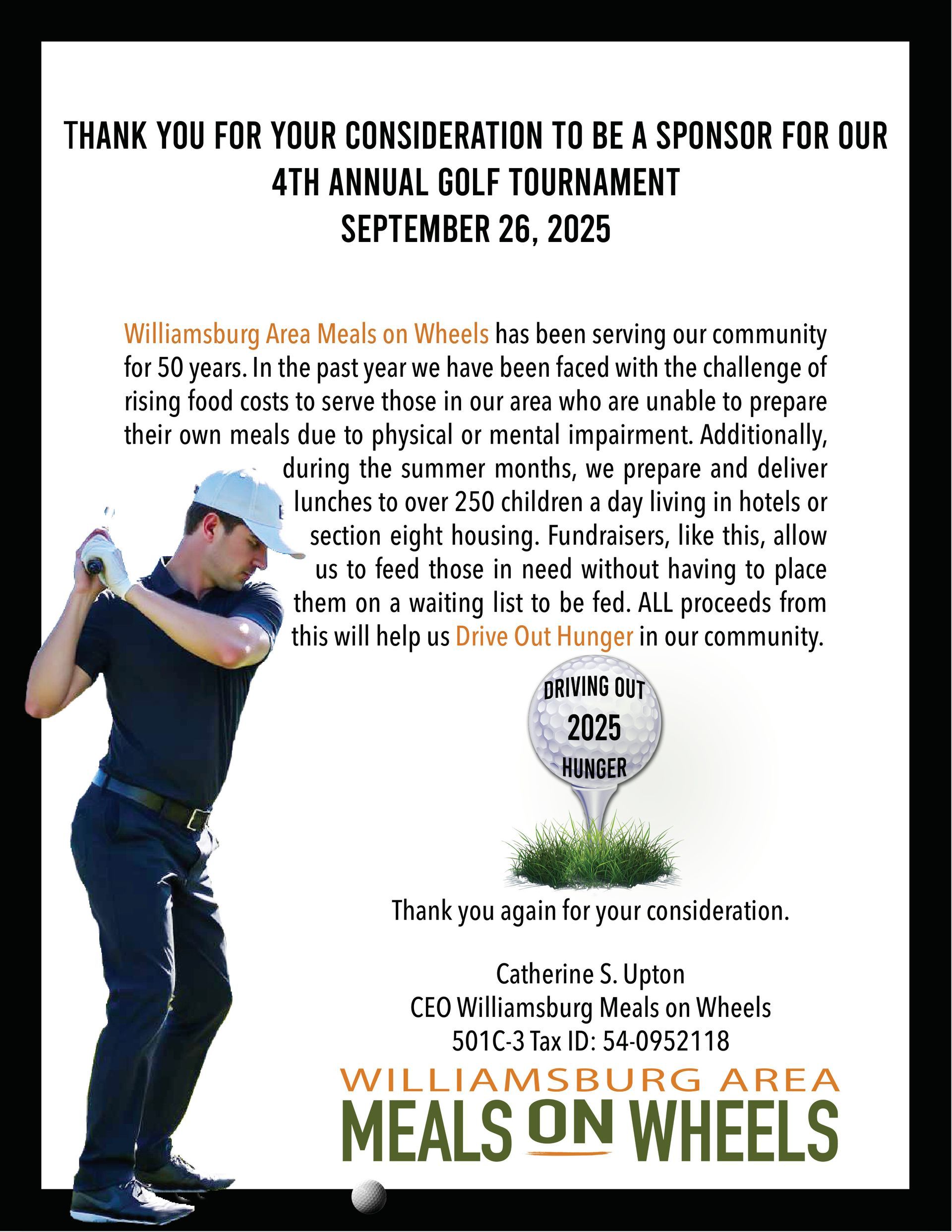 A man is swinging a golf club at a golf ball.