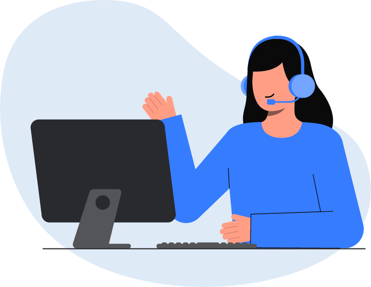 Uma mulher usando fones de ouvido está sentada em frente a um computador.