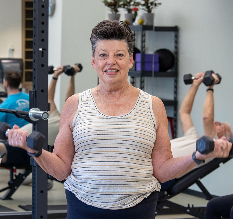 older woman exercising at core principles personal training in stamford connecticut