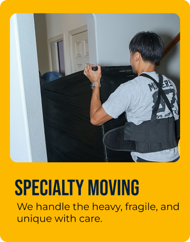 Movers carefully handling a large fragile item.