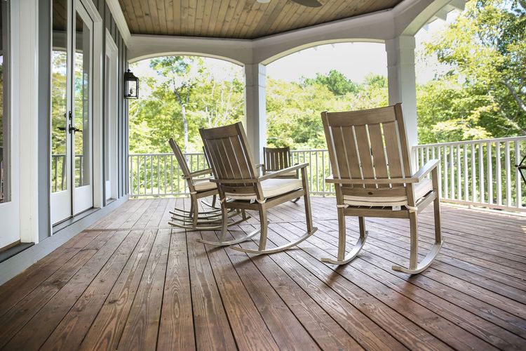 Photo of rocking chairs on a covered porch