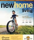 A young boy is riding a bike on the cover of a new home living magazine.