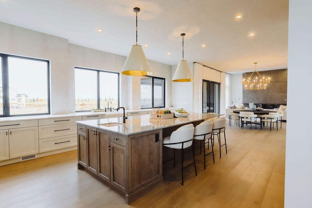 There is a large island in the middle of the kitchen.