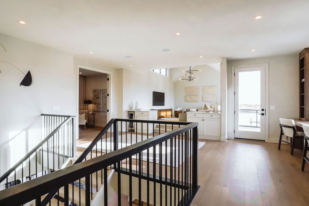 There is a staircase leading up to the second floor of a house.