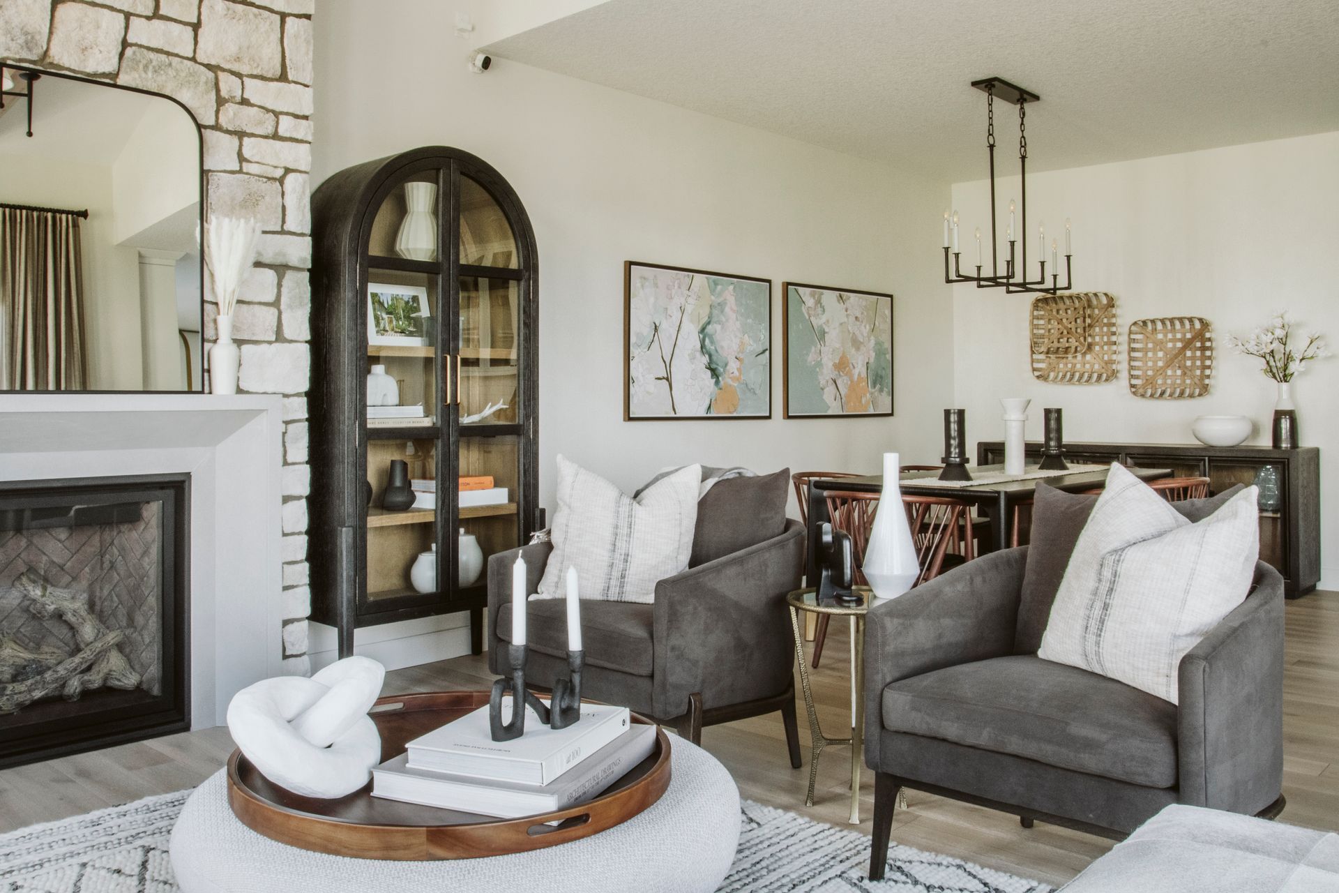 A living room filled with furniture and a fireplace.