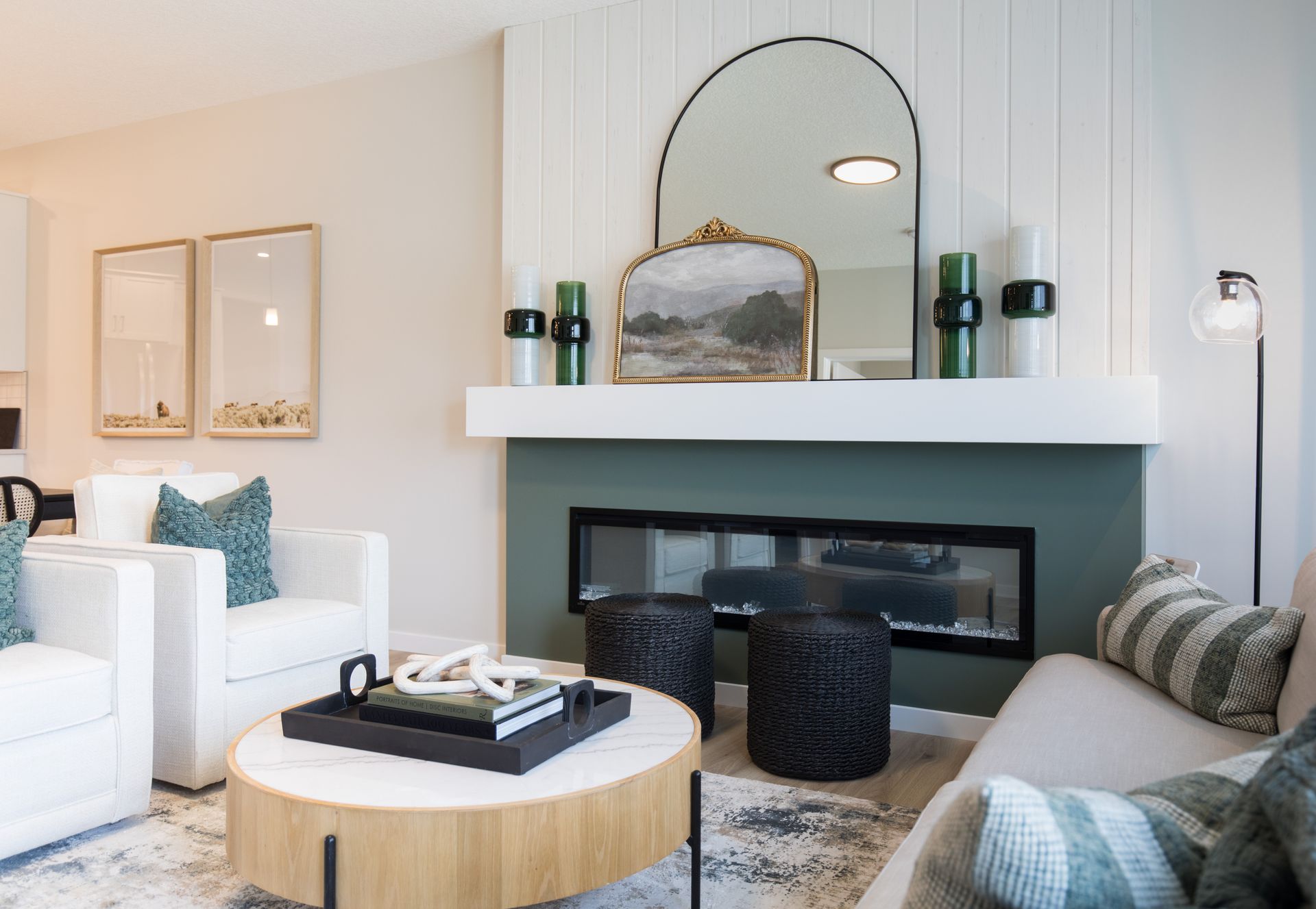 There is a fireplace in the middle of the living room.