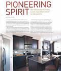 A picture of a kitchen in a magazine called pioneering spirit.
