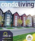 The cover of condo living magazine with a picture of a row of apartment buildings.