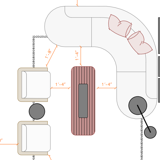 An aerial view of a living room with a couch and chairs