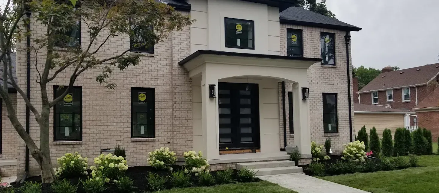 A bathroom with a walk in shower and a toilet