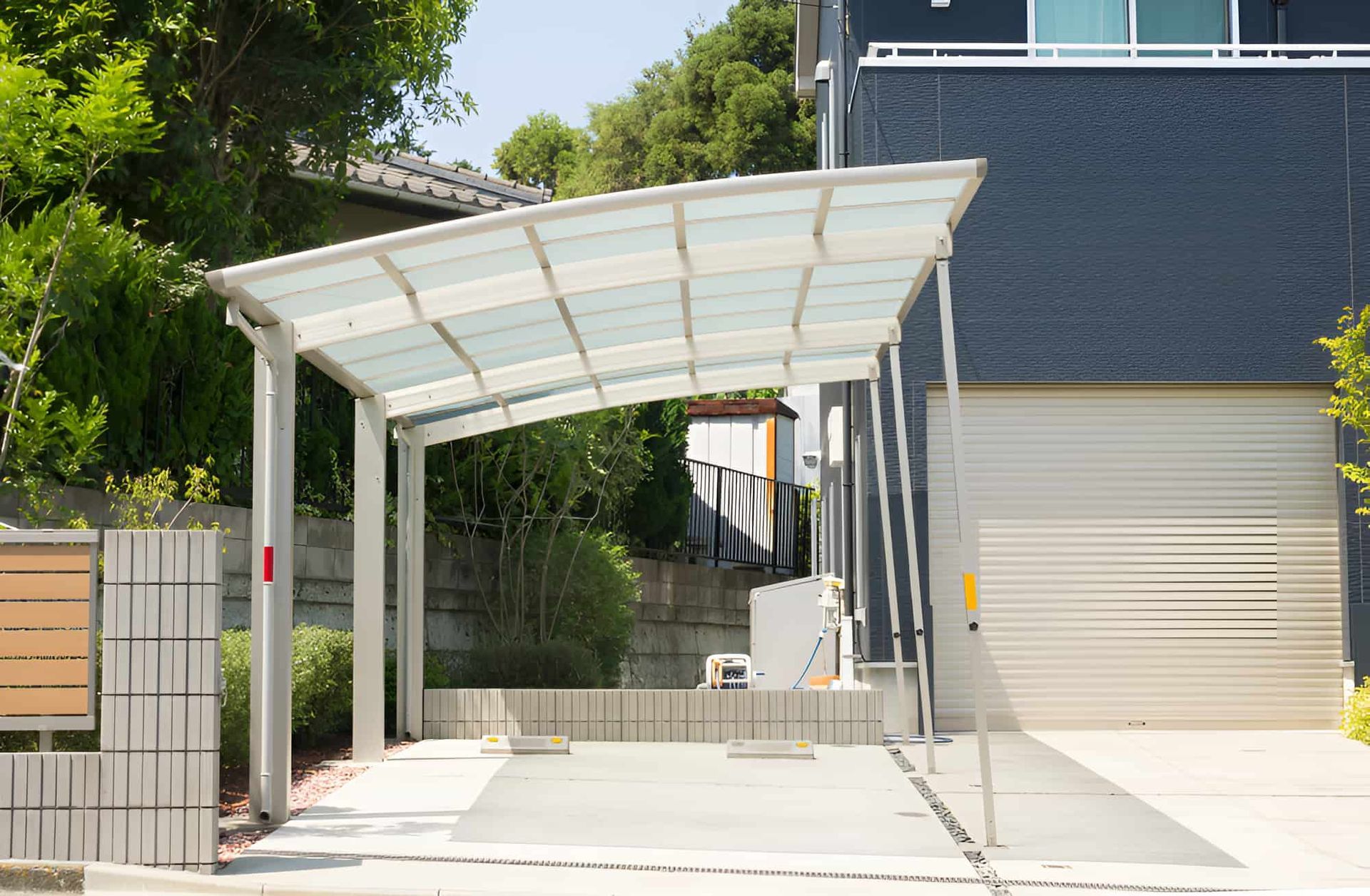 A Carport Structure With a Covering Above It — Pride Carpentry & Maintenance In Berkeley Vale, NSW