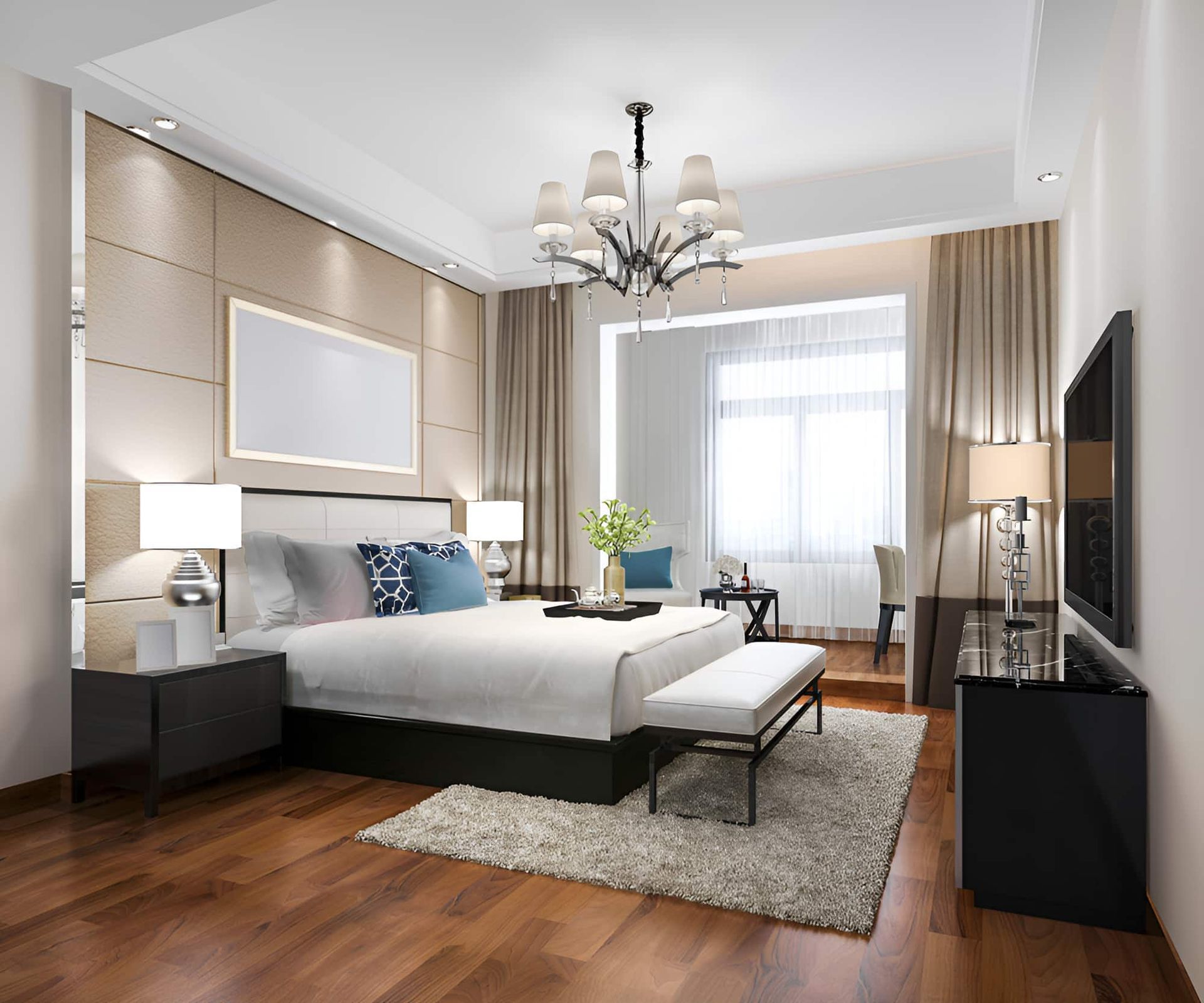 A Bedroom With a Bed, Chair, and Table — Pride Carpentry & Maintenance In Berkeley Vale, NSW