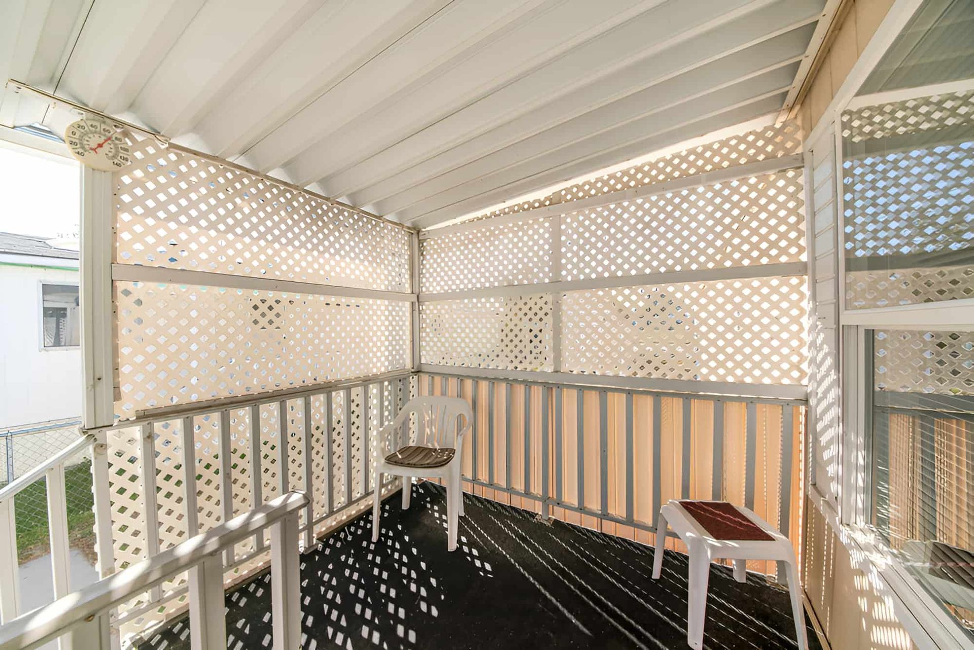 A Balcony Surrounded by a Privacy Screen — Pride Carpentry & Maintenance In Berkeley Vale, NSW