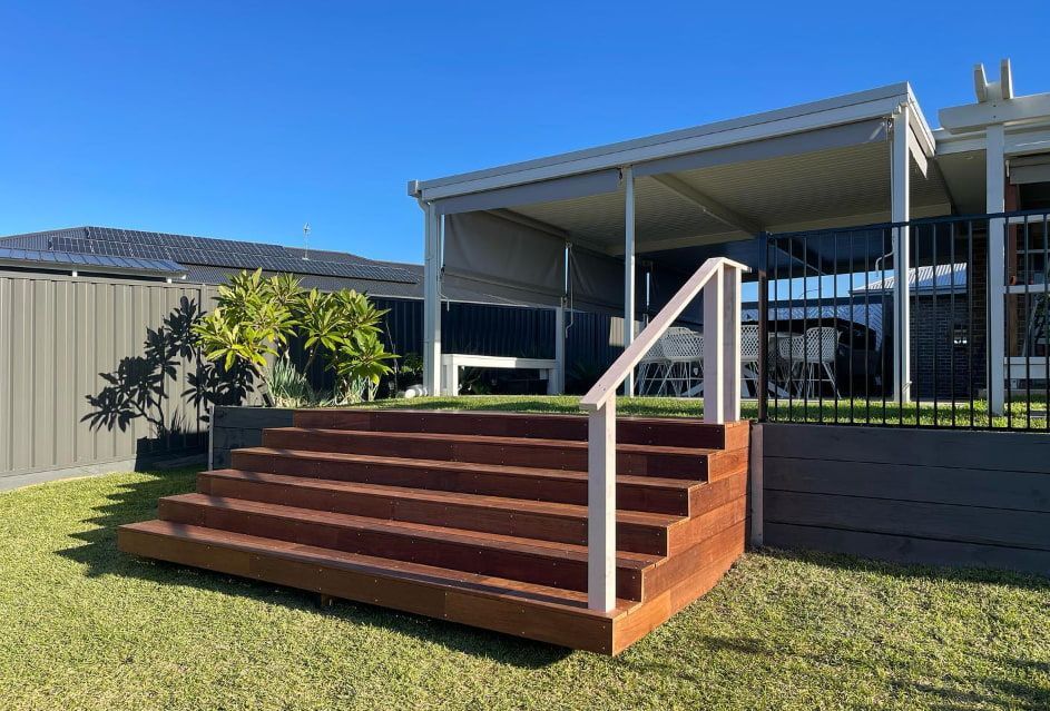 A Deck With Wooden Steps — Pride Carpentry & Maintenance In Central Coast, NSW