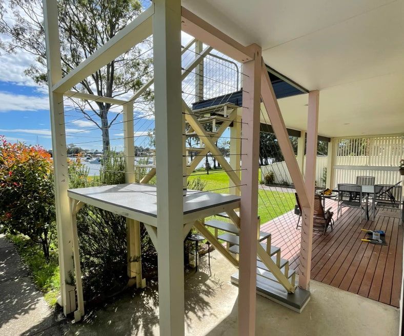 A House With a Deck and Stairs — Pride Carpentry & Maintenance In Lake Macquarie, NSW