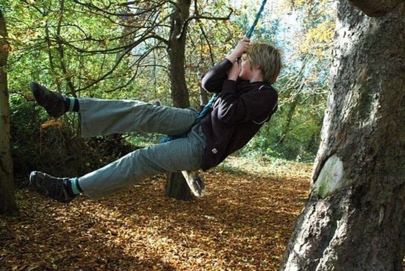 Person swinging on a rope
