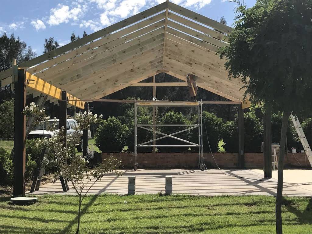 Builder Constructing an Outdoor Space