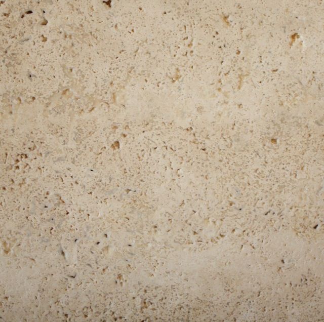 Beige and tan striped marble pattern, resembling layered stone.