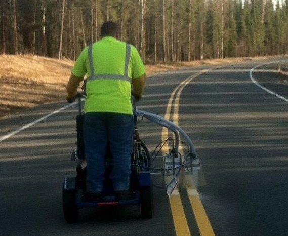 Happy workers on a pavement and asphalt project in Wasilla, AK