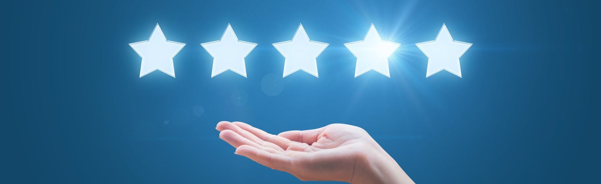 Image of 5 stars and caring hand as explainer for Blue Sky Signs 5 star google reviews
