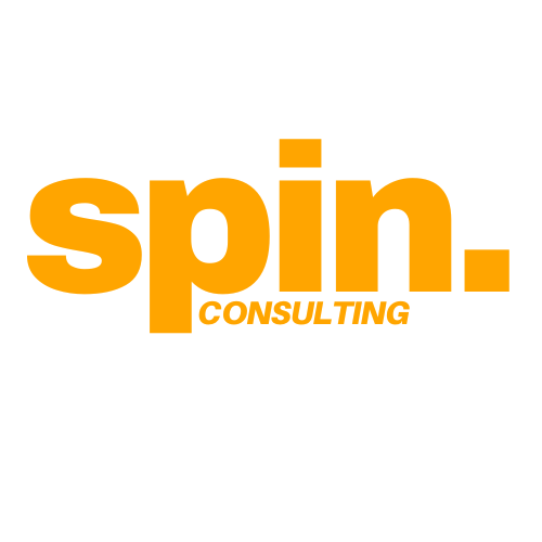 An orange spin consulting logo on a white background