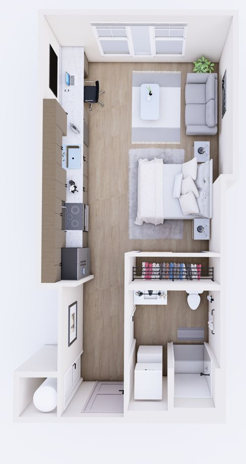 Top-down view of a small apartment layout. Contains a bed, couch, desk, closet, and bathroom.